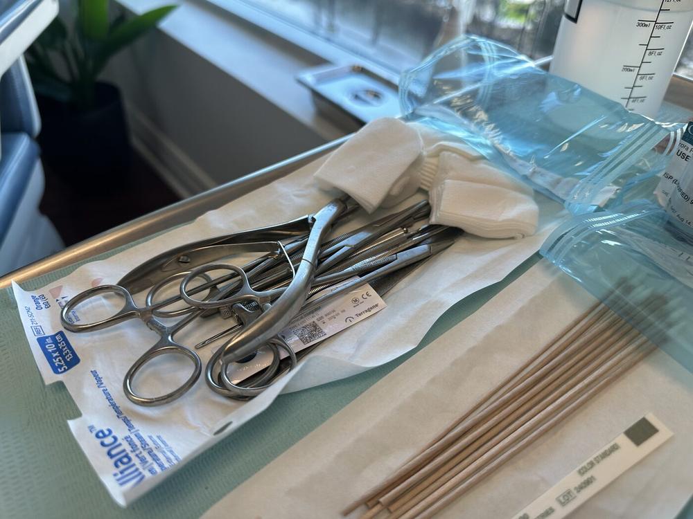 Sterilized instruments in their sealed pouch, ready for a procedure